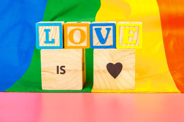 LGBT concept, text love, LGBT flag - Фото, зображення
