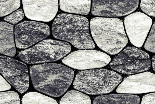 Wall of small stone texture background. endless seamless background fill - Photo, Image