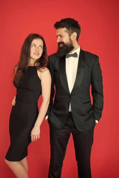 Bearded gentleman wear tuxedo girl elegant dress. Formal dress code. Visiting event or ceremony. Couple ready for award ceremony. Main rules picking clothes. Corporate party. Award ceremony concept - Foto, Imagem
