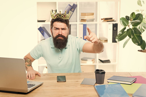 Issuing decree. Office is my kingdom. King of office. Man bearded businessman wear golden crown. Top manager head office. Boss enjoying glory. Head office and ceo concept. Chief executive officer - Фото, зображення