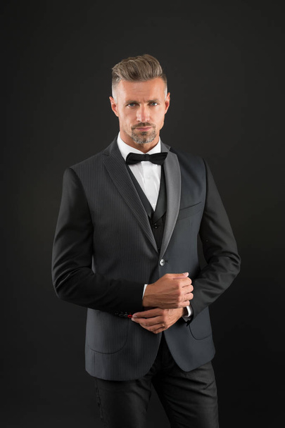 Refinement in every detail. Tailored suit. Fashion shop. Rent suit service. Elegant fashion outfit for event. Gentleman modern style. Guy well groomed handsome macho wear tuxedo. Fashion clothes - Photo, Image
