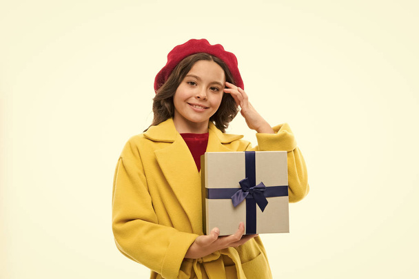 Birthday wish list. Girl happy kid hold birthday gift box. Birthday shopping. Birthday girl carry present with ribbon bow. Visit fashion store to choose gift. Every girl dream about such surprise - Foto, immagini
