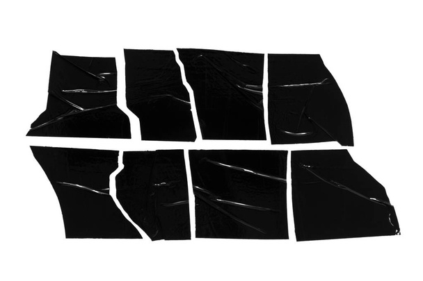 Conjunto de cinta adhesiva negra rota aislada sobre fondo blanco
 - Foto, Imagen
