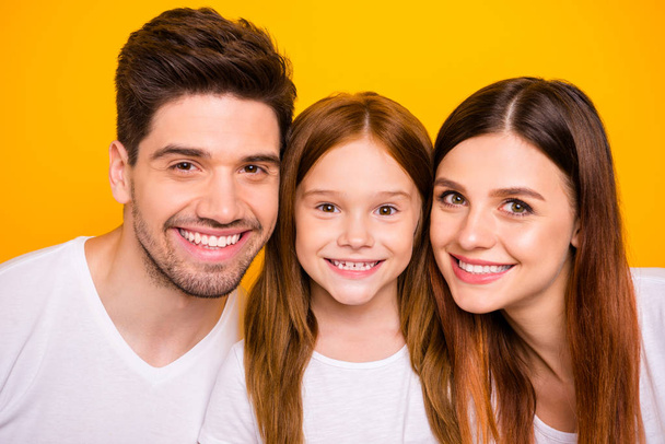 Close up photo of dad mom and small foxy lady happy together wear casual outfit isolated yellow background - Valokuva, kuva