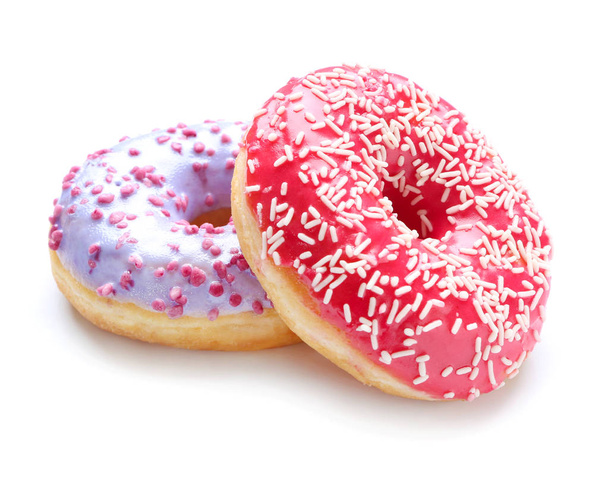 Süße leckere Donuts auf weißem Hintergrund - Foto, Bild