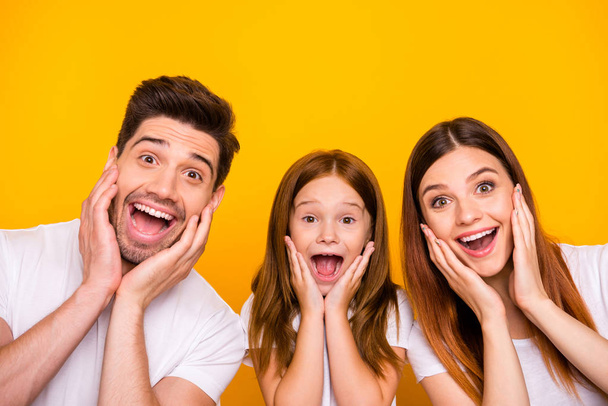 Photo of dad mom and small foxy lady overjoyed by great news wear casual outfit isolated yellow background - Fotoğraf, Görsel