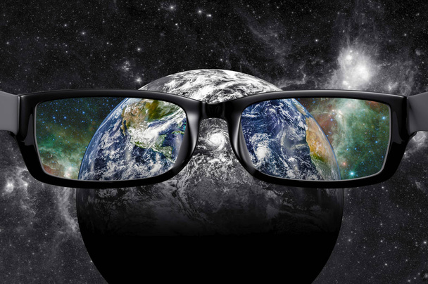 View through glasses of planet earth in color - Photo, Image