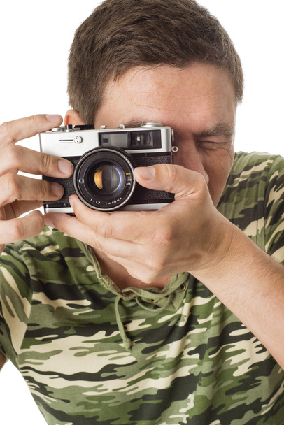 Man taking pictures with retro camera - Photo, Image