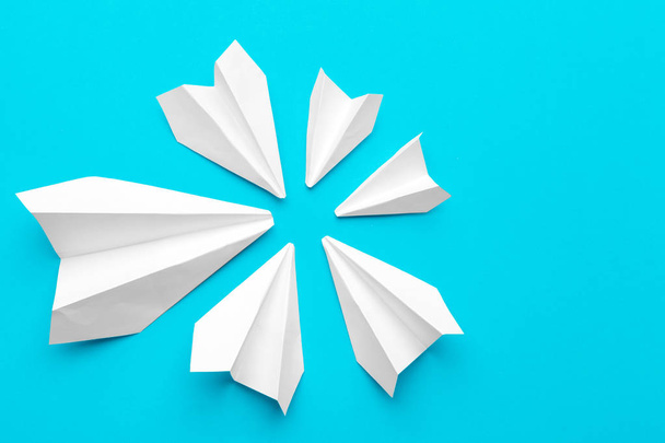 white paper airplane on a blue background - Photo, image