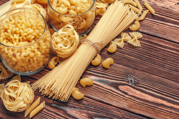 Various types of Italian pasta rustic background - Photo, Image