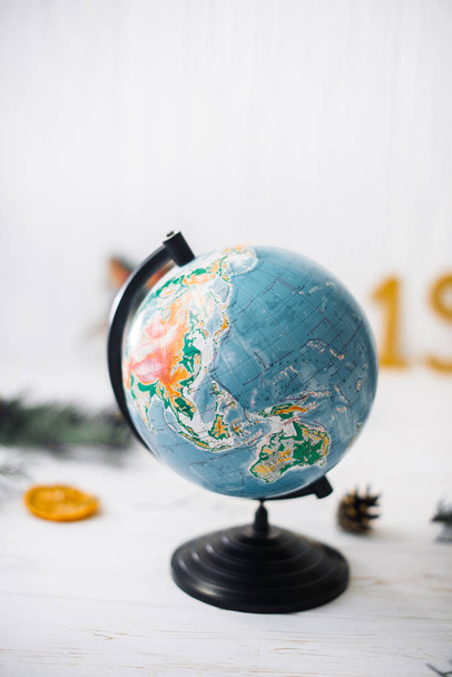 Globe on white wooden blurred. Travel concept - Foto, immagini