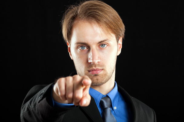 Handsome businessman pointing his finger at you - Foto, afbeelding