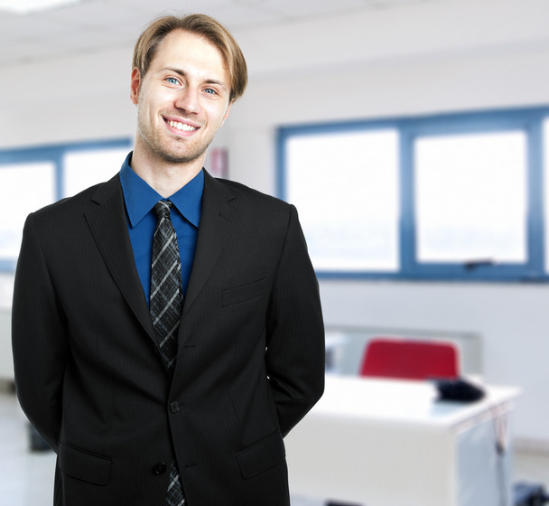 Confident young businessman in his office - Photo, Image