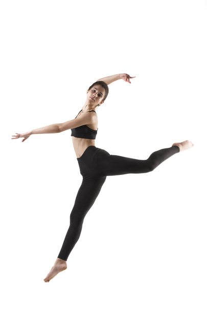 girl doing gymnastic exercises  - Fotó, kép