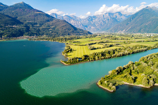 Lake Como (IT) - Mouth of the river Adda in the lake - aerial view - Photo, Image