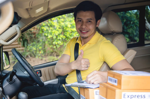 Young Asian Delivery man  driving van to delivering packages - Photo, Image
