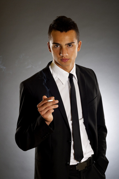 Empresário fumador
 - Foto, Imagem