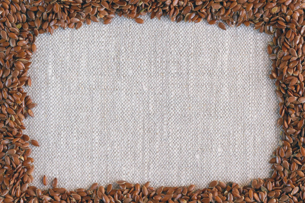 Семена льна Linum usitatissimum - полезный и лекарственный продукт. Крупный план
 - Фото, изображение