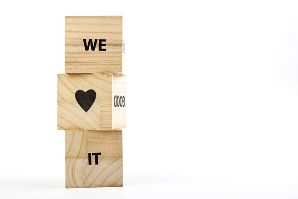 Wooden cubes with the scription me love it on a white backgro
 - Фото, изображение