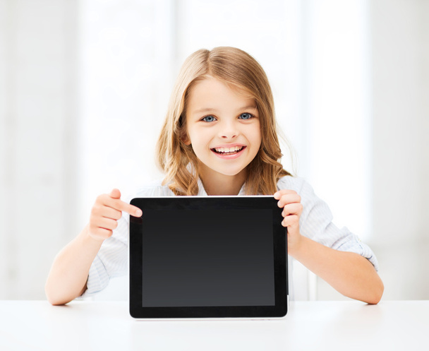 Girl with tablet pc at school - Photo, image