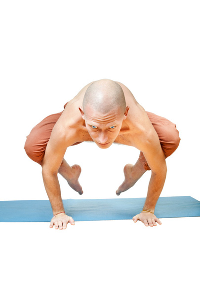 Man doing yoga exercise - Foto, Bild