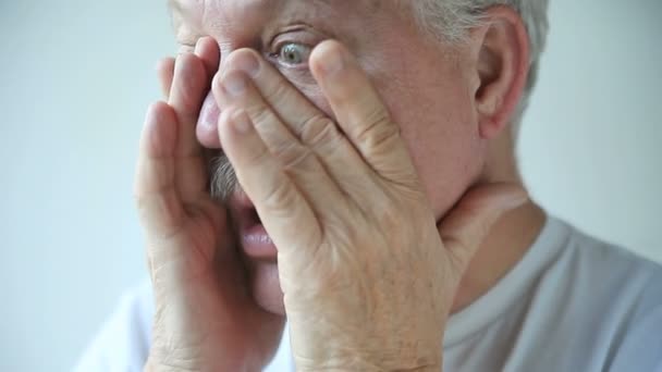 Older man has nasal congestion and other signs of a cold or flu - Footage, Video