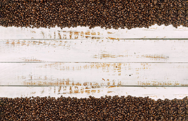 Coffee beans on rustic wood background - Photo, Image