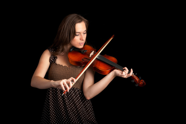 Violinist isolated on black background - Фото, зображення