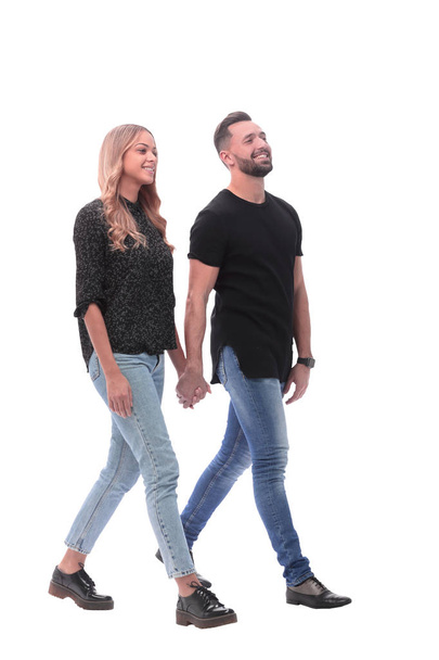 in full growth. young couple walking together - Foto, imagen