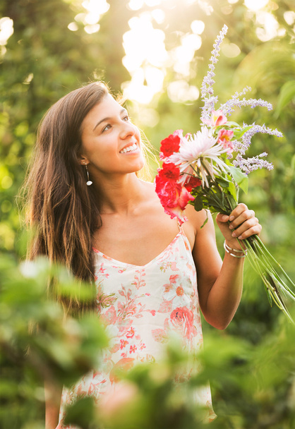 Young Woman with Flowers - Foto, Imagem