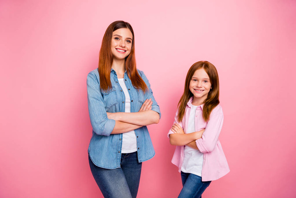 Portrait of friendly ladies crossing their hands with toothy smile isolated over pink background - Fotoğraf, Görsel