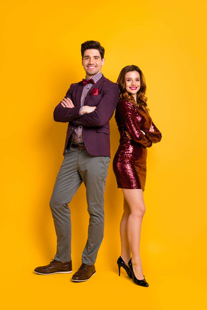 Vertical full length body size view of his he her she nice-looking attractive gorgeous content cheerful cheery gentleman lady folded arms isolated over bright vivid shine yellow background - Φωτογραφία, εικόνα