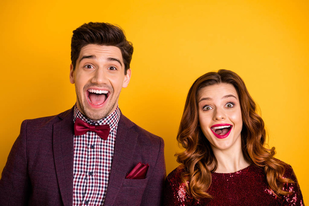 Close-up portrait of his he her she nice-looking attractive lovely glad cheerful cheery funny people having fun screaming opened mouth isolated on bright vivid shine yellow background - Foto, imagen