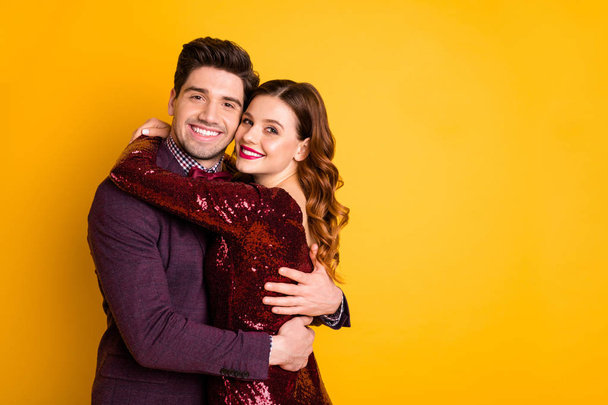 Portrait of his he her she nice-looking attractive lovely lovable smart charming sweet cheerful cheery people cuddling spending celebratory time isolated over bright vivid shine yellow background - Fotoğraf, Görsel