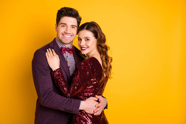 Portrait of his he her she nice-looking attractive lovely smart charming pretty cheerful gentle people cuddling spending festive isolated over bright vivid shine yellow background - Fotoğraf, Görsel