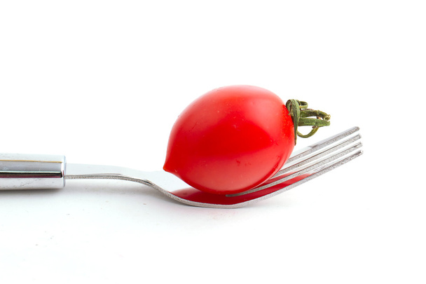 Cherry tomato on fork - Photo, image