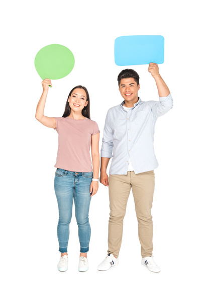 asian man with speech bubble and girl with thought bubble smiling at camera on white background - Fotoğraf, Görsel