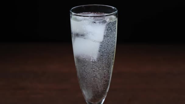 Transparent glass of champagne with bubble. - Video