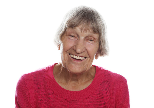 Viejo feliz mujer sorprendida sobre fondo blanco, concepto de estilo de vida
 - Foto, Imagen