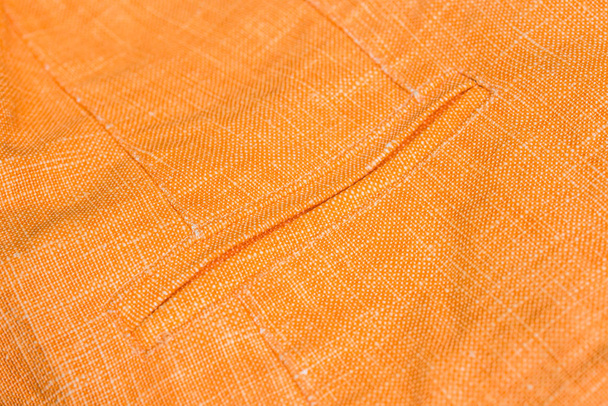textil de lino naranja con bolsillo
 - Foto, imagen