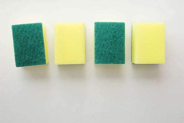 sponges for washing dishes on a light background - Фото, зображення