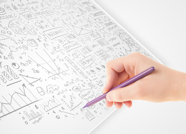 Lidská ruka kreslí nápady na bílém papíru - Fotografie, Obrázek