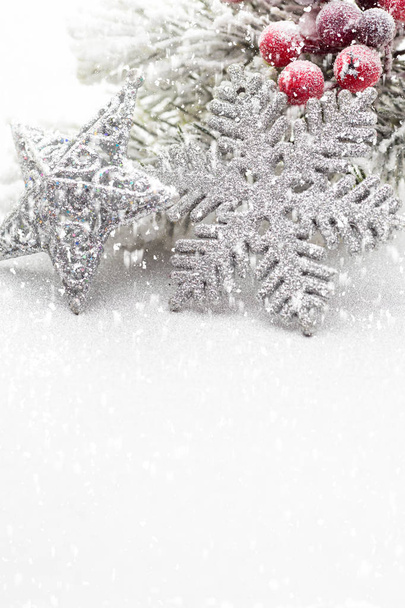 Christmas decoration over silver background. - Foto, imagen