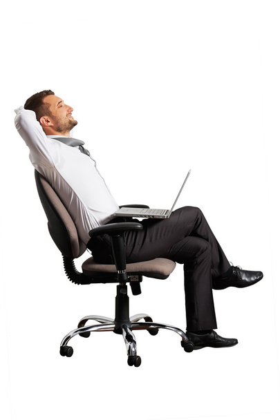 Feliz hombre de negocios sentado
 - Foto, Imagen