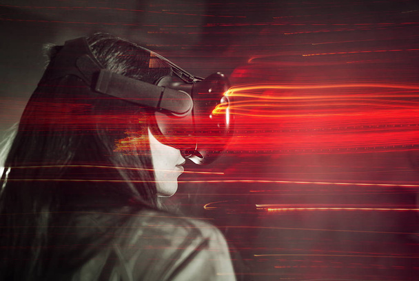 girl uses a virtual reality helmet, the concept of modern technology, the effect of double exposure. - Zdjęcie, obraz