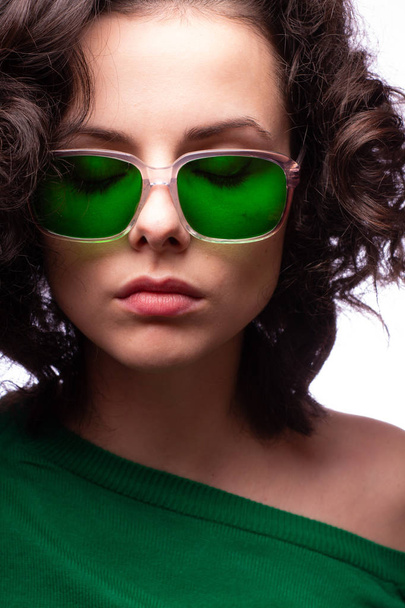 beautiful girl in green glasses and green sweater - Фото, изображение
