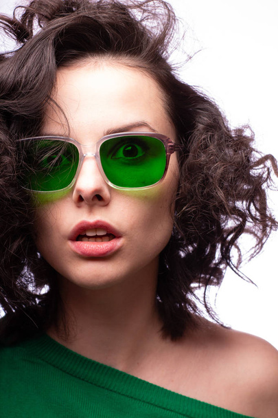 beautiful girl in green glasses and green sweater - Foto, Imagen