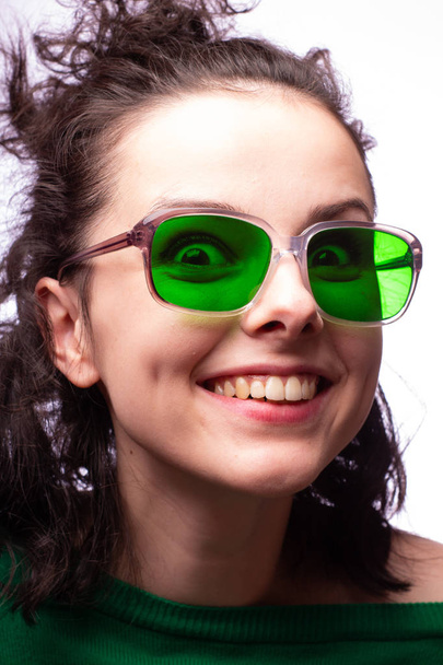 beautiful girl in green glasses and green sweater - Fotografie, Obrázek