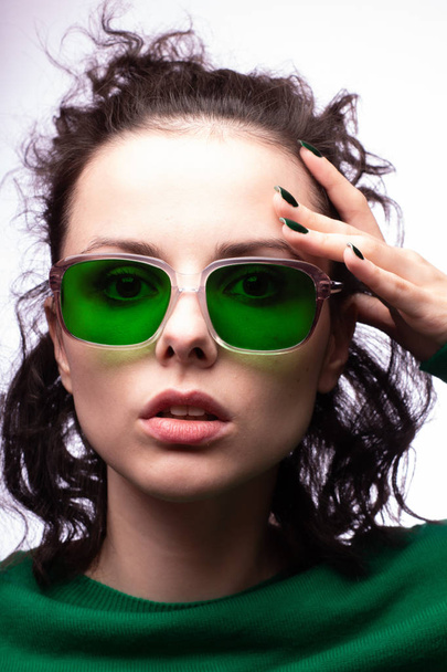 beautiful girl in green glasses and green sweater - Фото, зображення