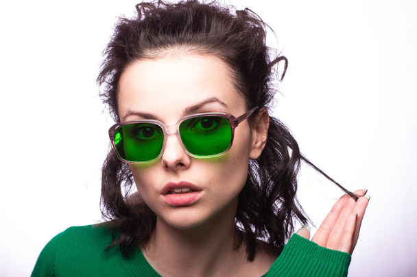 beautiful girl in green glasses and green sweater - Fotoğraf, Görsel